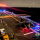 Illustration for article titled This Is An Amazing Shot Of Night Harrier Operations Aboard The USS Essex